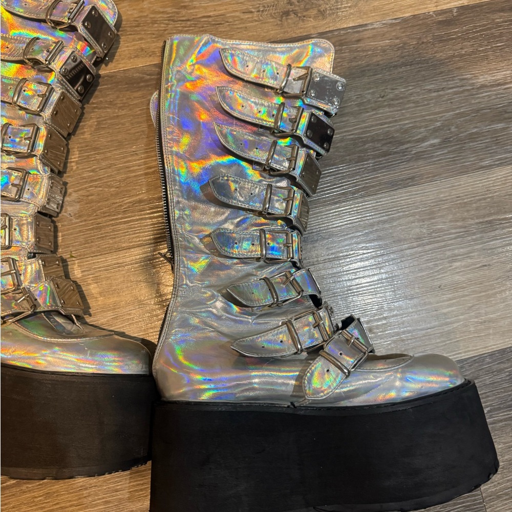 Demonia Galactic Boots reflective exterior, professionally cleaned, some wear.